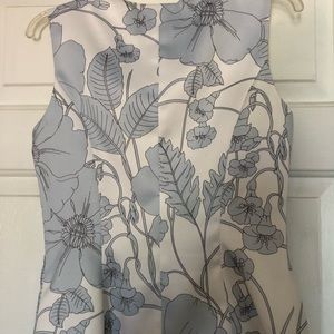 BCBG flowery sleeveless top in pale blue and white